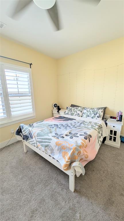 8933 Frostweed Road Frisco, TX 75035 - Photo 20 of 36 a bedroom with a bed and window