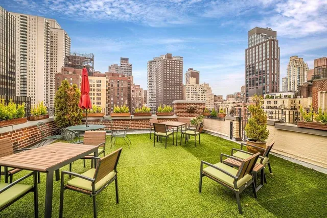 a bathroom with a sink a shower and a mirror