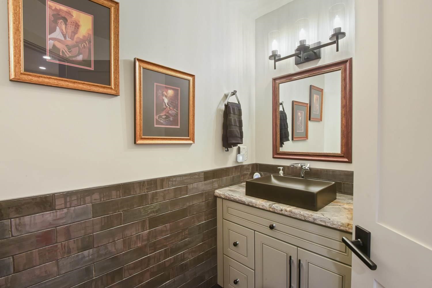 1163 Statford Way Tahoe Vista, CA 96148 - Photo 19 of 22 a bathroom with a double vanity sink and a mirror