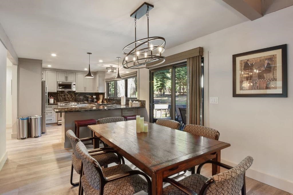 1163 Statford Way Tahoe Vista, CA 96148 - Photo 9 of 22 a view of a dining room with furniture window and wooden floor