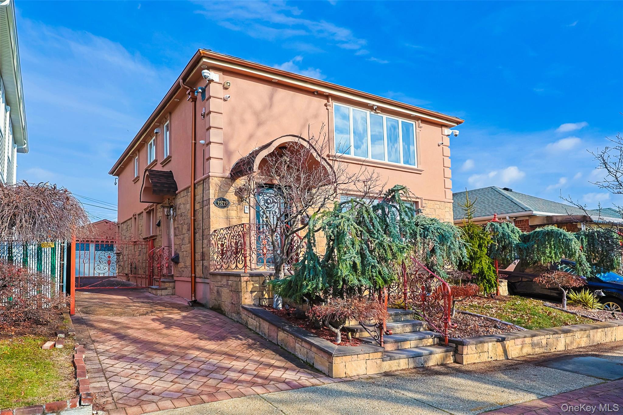 157-19 16th Road Queens, NY 11357 - Photo 2 of 33 a front view of a house with garden