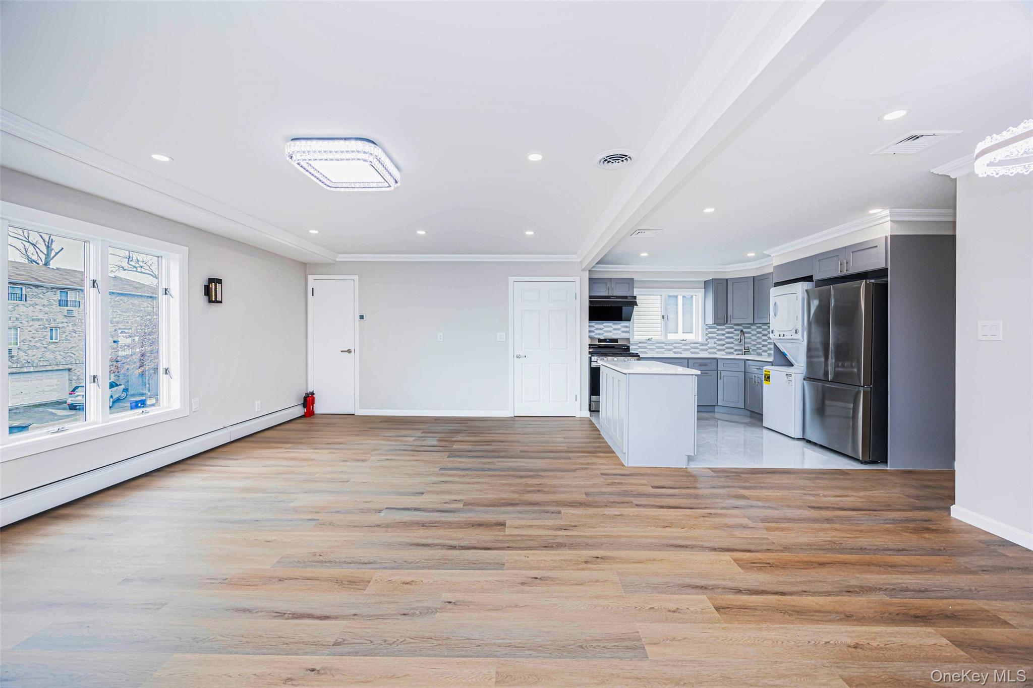 157-19 16th Road Queens, NY 11357 - Photo 32 of 33 a view of a kitchen with a sink and cabinets