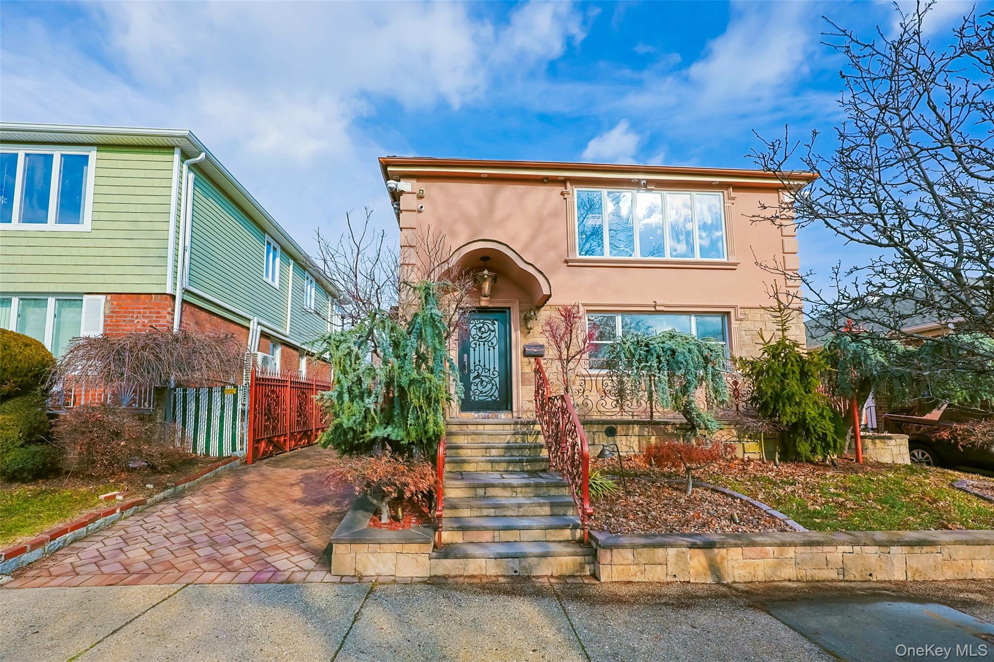 157-19 16th Road Queens, NY 11357 - Photo 3 of 33 a front view of a house with garden
