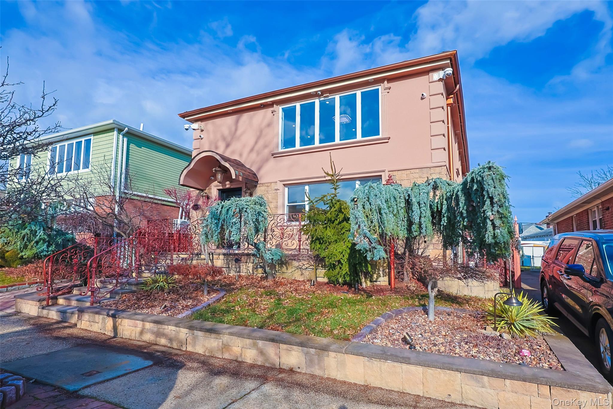 157-19 16th Road Queens, NY 11357 - Photo 4 of 33 a front view of a house with garden