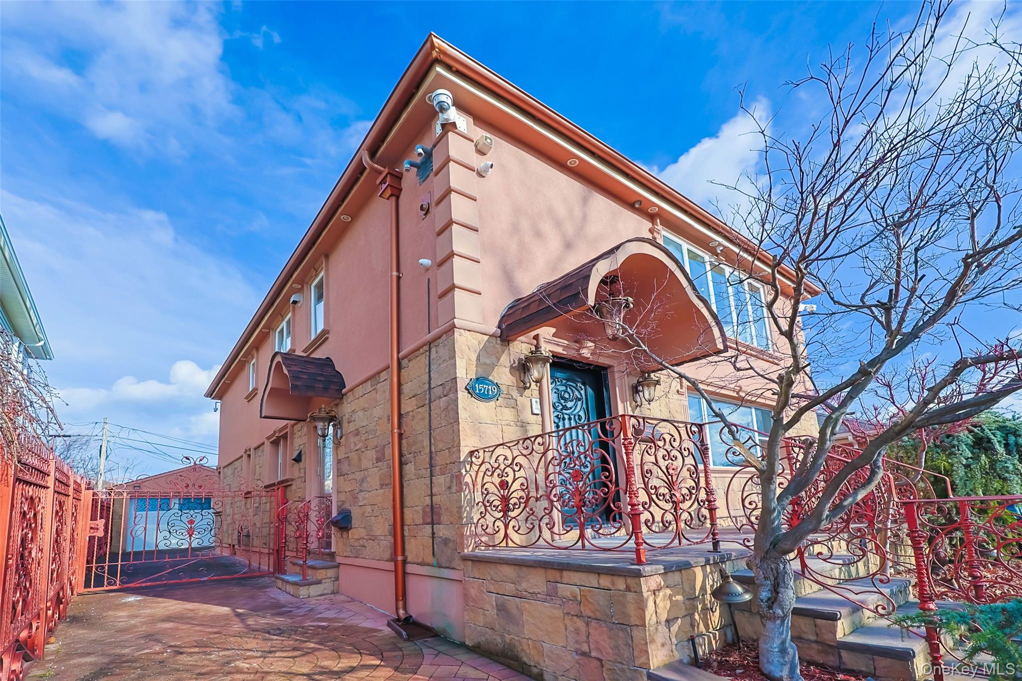 157-19 16th Road Queens, NY 11357 - Photo 5 of 33 a view of a building with a tree