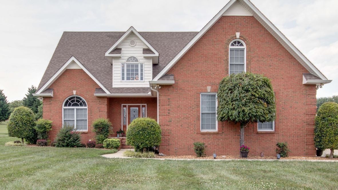 92 Freeman Court Winchester, TN 37398 - Photo 1 of 19 a front view of a house with a garden