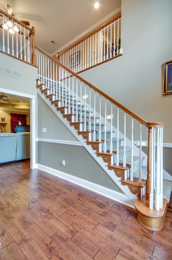 92 Freeman Court Winchester, TN 37398 - Photo 17 of 19 a view of staircase with lots of frames on wall and a large window