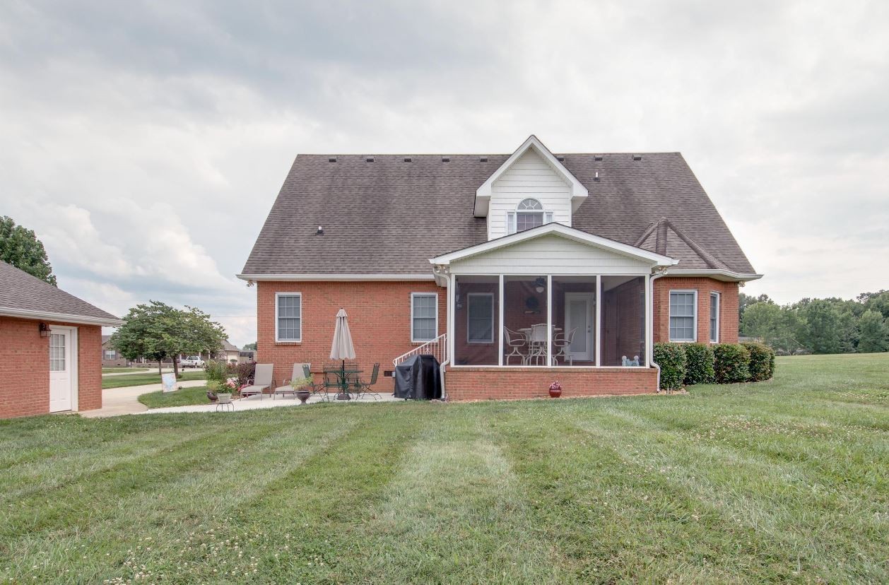 92 Freeman Court Winchester, TN 37398 - Photo 2 of 19 a front view of a house with a yard and trees