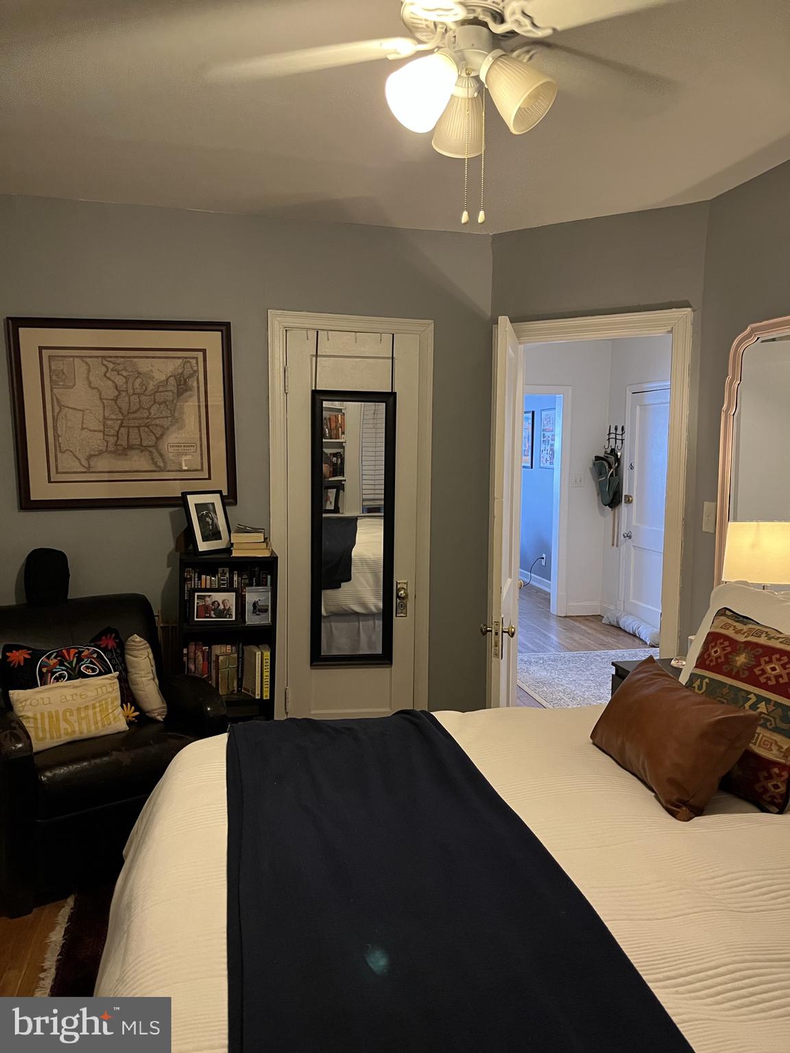 1830 Independence Avenue Southeast, Unit 4 Washington, DC 20003 - Photo 16 of 23 a bedroom with a bed and a chandelier