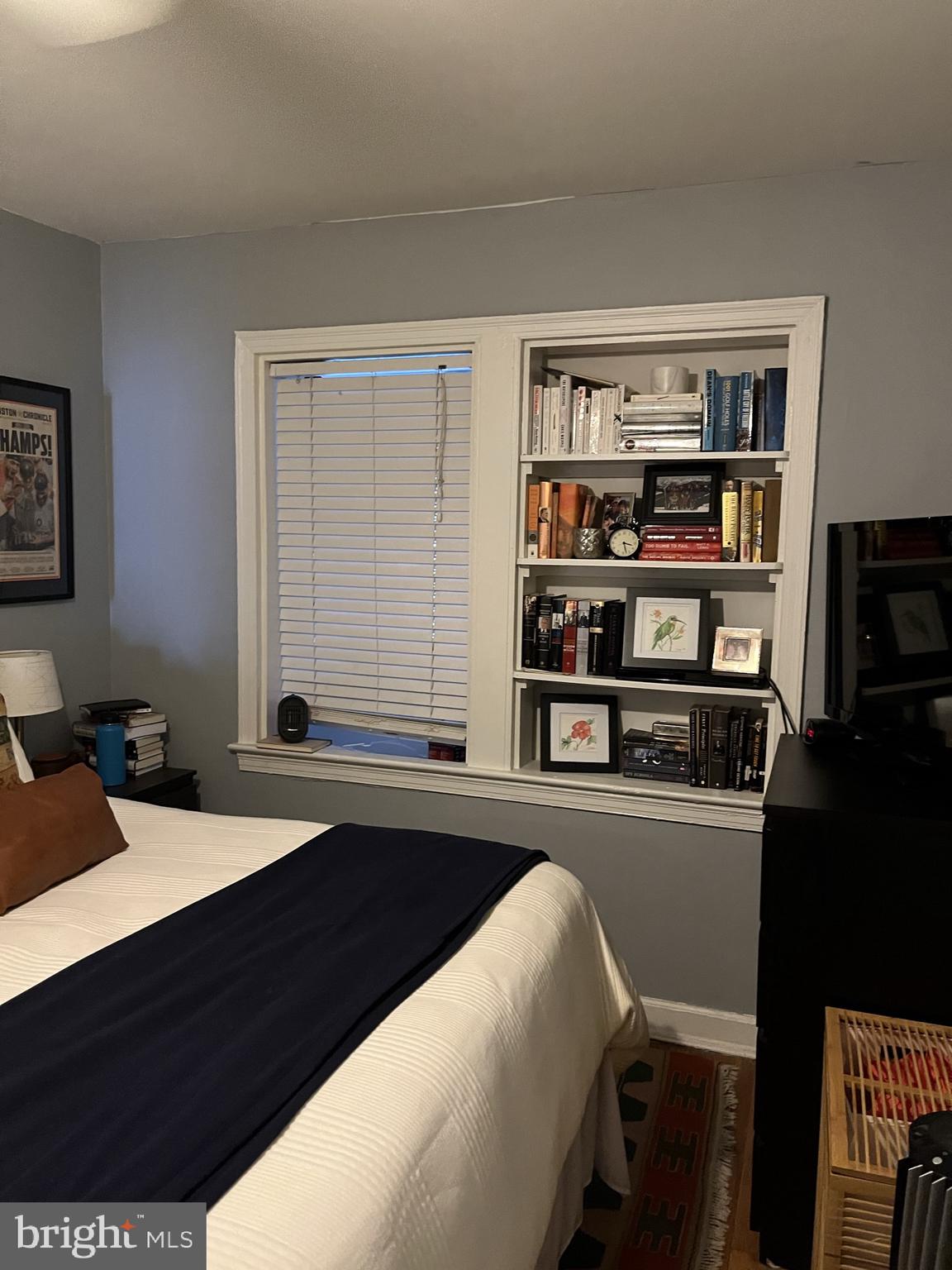 1830 Independence Avenue Southeast, Unit 4 Washington, DC 20003 - Photo 17 of 23 a living room with stainless steel appliances kitchen island granite countertop a table chairs and a large window