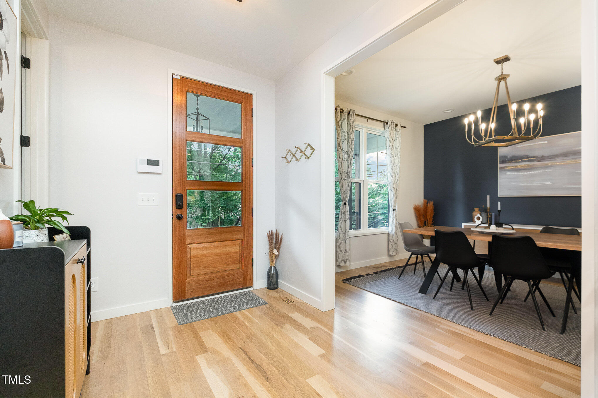 517 Bart Street Raleigh, NC 27610 - Photo 4 of 43 a view of a dining room with furniture window and wooden floor