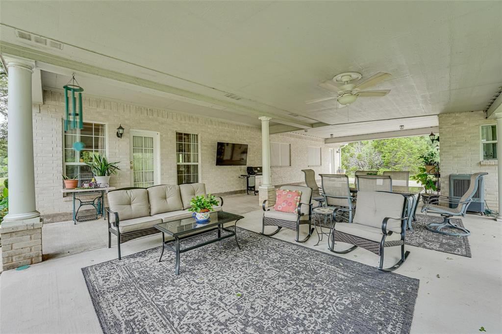 32018 Dove Trail Whitney, TX 76692 - Photo 21 of 36 a living room with furniture and a large window