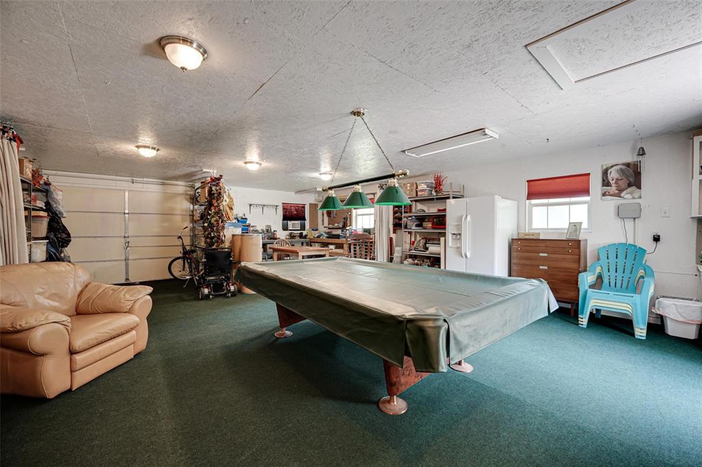 32018 Dove Trail Whitney, TX 76692 - Photo 26 of 36 a living room with furniture and a flat screen tv