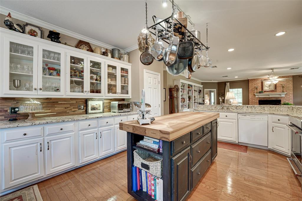 32018 Dove Trail Whitney, TX 76692 - Photo 9 of 36 a kitchen with a sink and cabinets