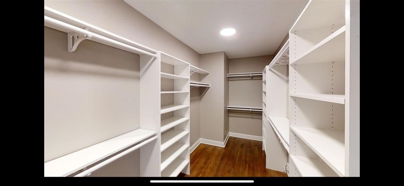 1254 Percheron Pass Collierville, TN 38017 - Photo 13 of 32 a view of walk in closet with empty racks