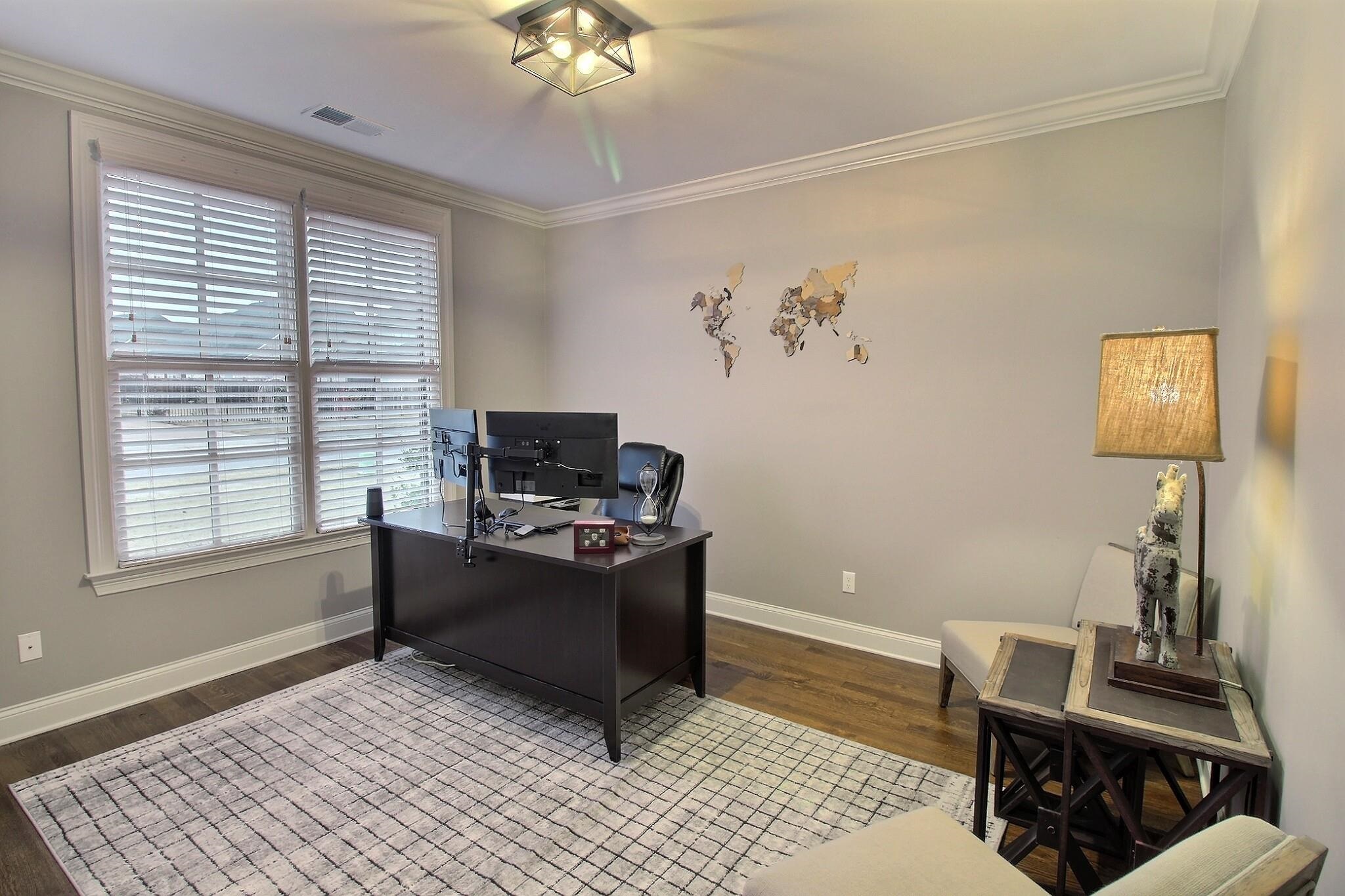1254 Percheron Pass Collierville, TN 38017 - Photo 14 of 32 a living room with furniture and a window