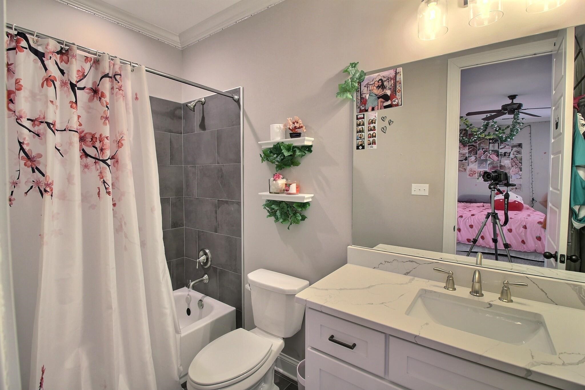 1254 Percheron Pass Collierville, TN 38017 - Photo 23 of 32 a bathroom with a sink toilet and shower