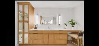 a view of walk in closet with empty room