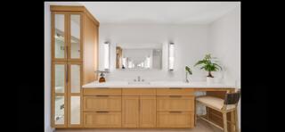 6110 North Ocean Boulevard, Unit 39 Ocean Ridge, FL 33435 - Photo 19 of 33 a bathroom with a sink and a mirror