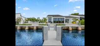 6110 North Ocean Boulevard, Unit 39 Ocean Ridge, FL 33435 - Photo 29 of 33 a view of a lake from a living room