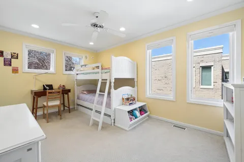 a bed room with furniture and a window