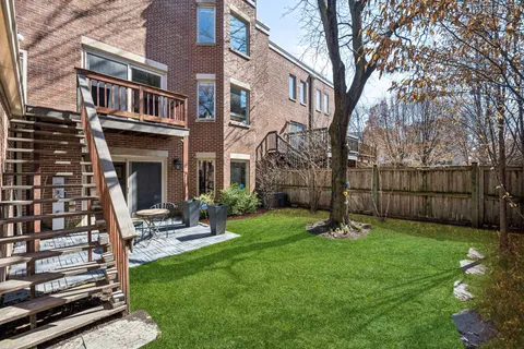 a view of a patio with a yard