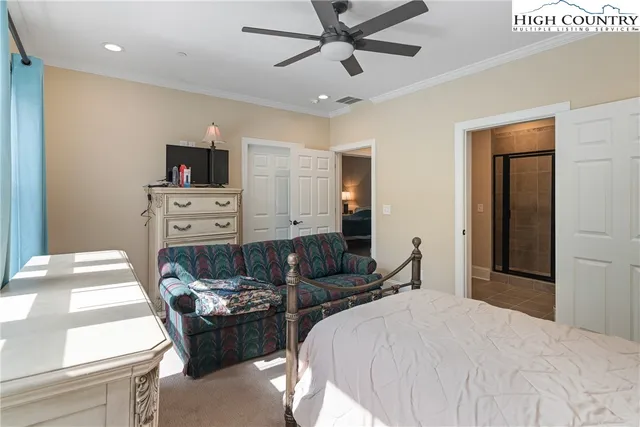 a bed room with a bed and furniture