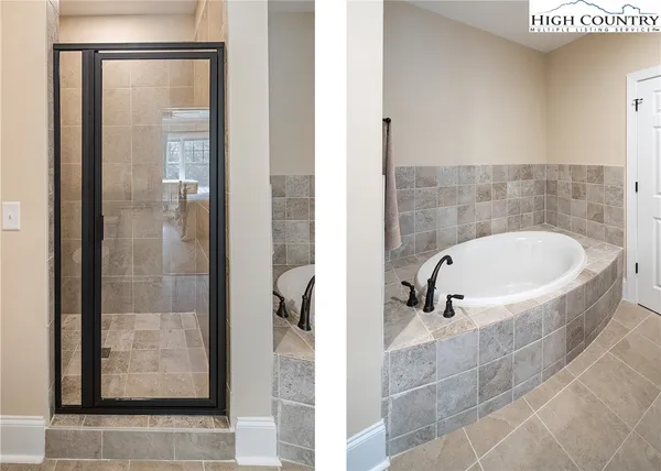 a bathroom with a bathtub and shower