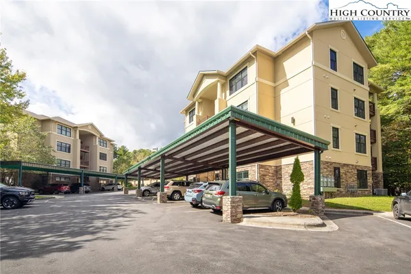 a view of a street with a building in the background