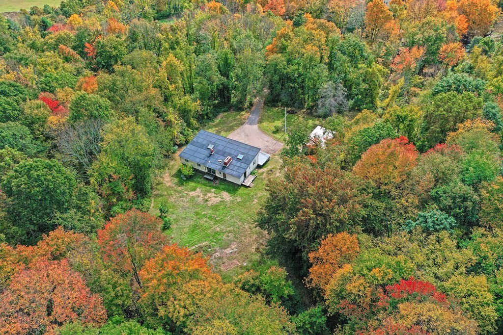 1167 Lower Road Hardwick, MA 01031 - Photo 11 of 42 an aerial view of a house with a yard