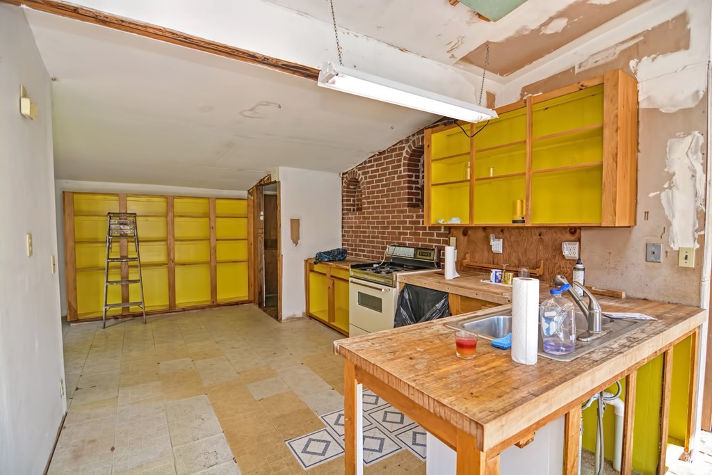1167 Lower Road Hardwick, MA 01031 - Photo 27 of 42 a kitchen that has a sink and a stove in it