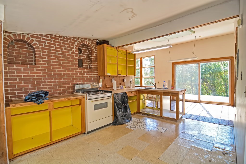 1167 Lower Road Hardwick, MA 01031 - Photo 28 of 42 a kitchen with sink cabinets and appliances