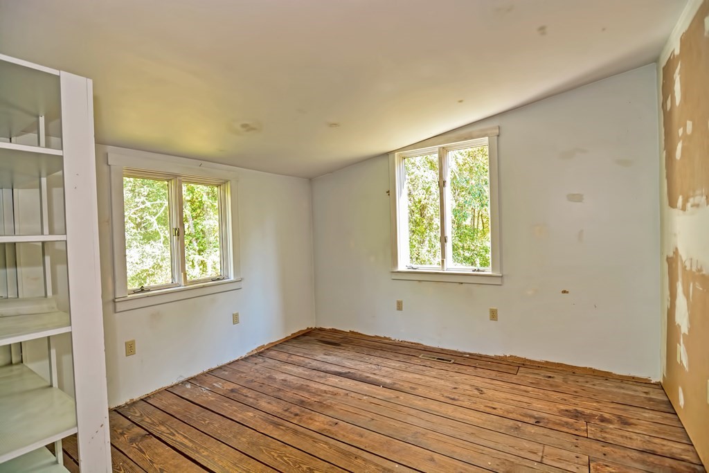 1167 Lower Road Hardwick, MA 01031 - Photo 31 of 42 a view of a room with wooden floor and windows
