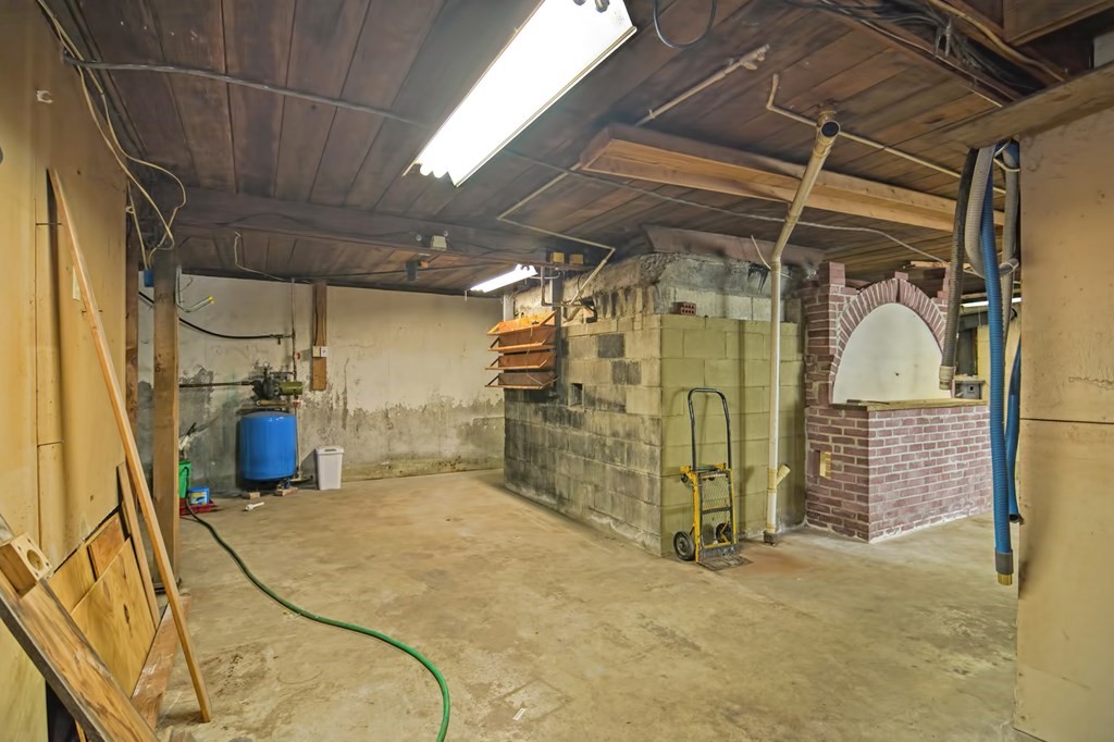 1167 Lower Road Hardwick, MA 01031 - Photo 33 of 42 a view of a garage with wooden door