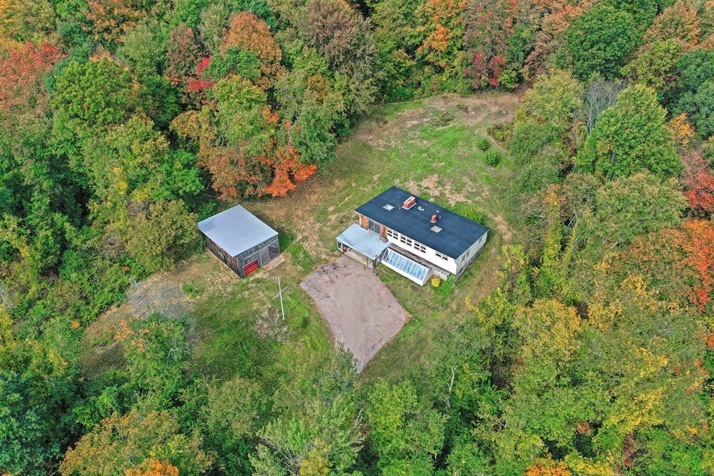 1167 Lower Road Hardwick, MA 01031 - Photo 8 of 42 an aerial view of a house with yard and outdoor seating