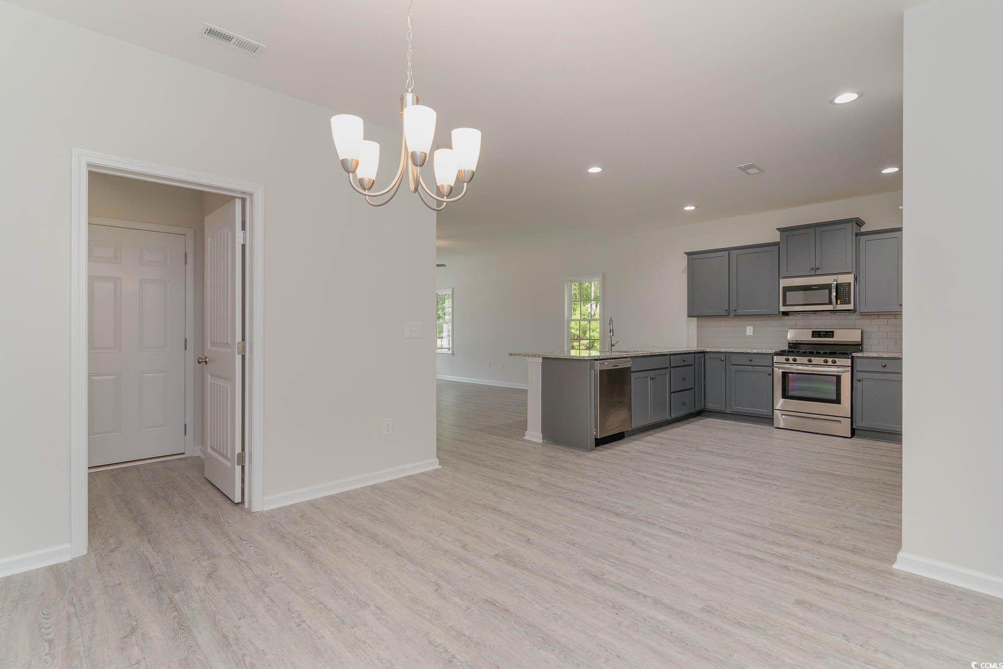 303 Lakota Loop Longs, SC 29568 - Photo 5 of 17 Kitchen featuring appliances with stainless steel