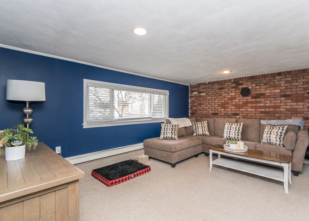 27 Sherman Street Needham, MA 02494 - Photo 21 of 32 a bedroom with furniture and a window