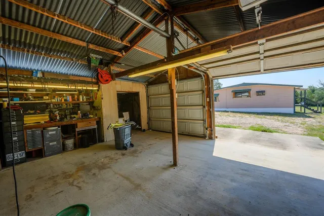 a view of a garage room with washing machine