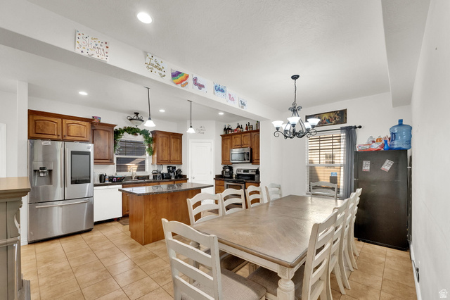 2026 Cres Drive South Mapleton, UT 84664 - Photo 5 of 18 Dining room with light tile patterned flooring and suspended lighting
