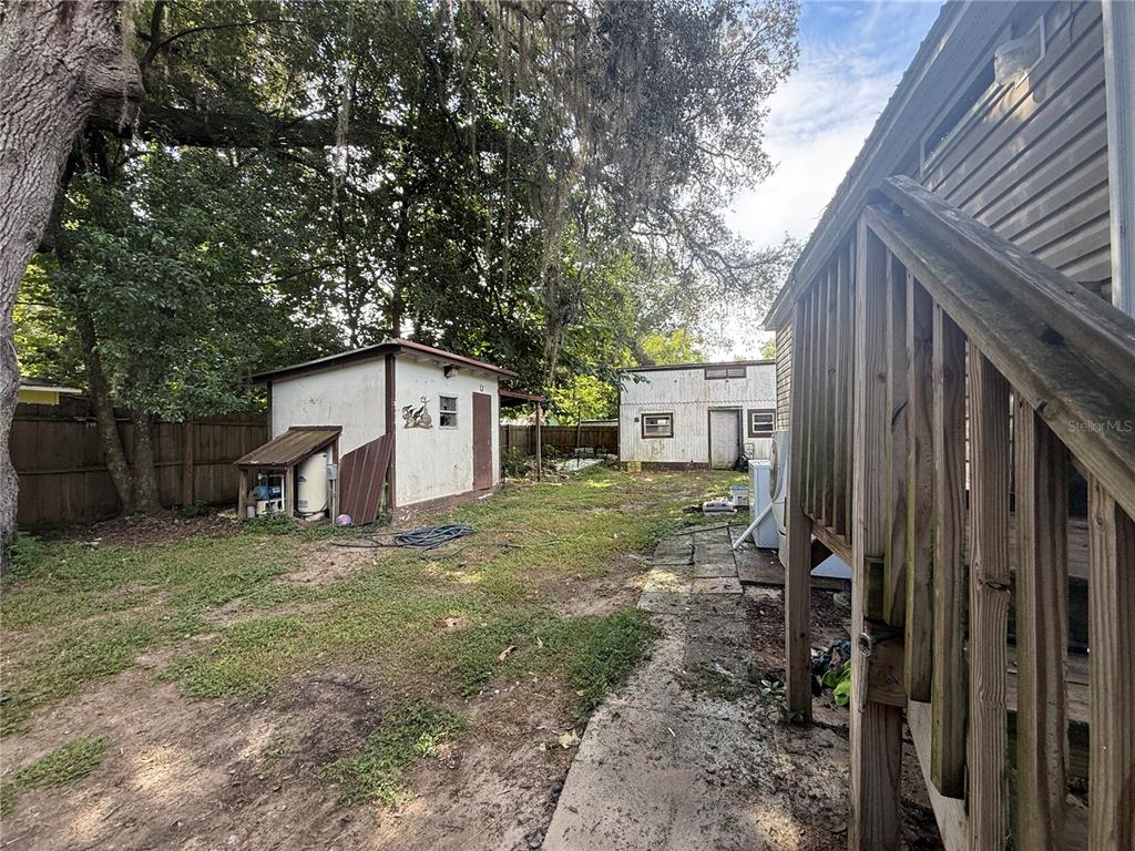 29040 Sentinel Street Nobleton, FL 34661 - Photo 17 of 21 a house view with a backyard space