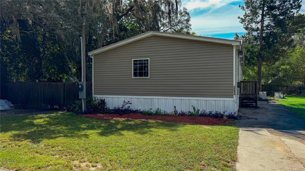 29040 Sentinel Street Nobleton, FL 34661 - Photo 20 of 21 a front view of a house with a yard