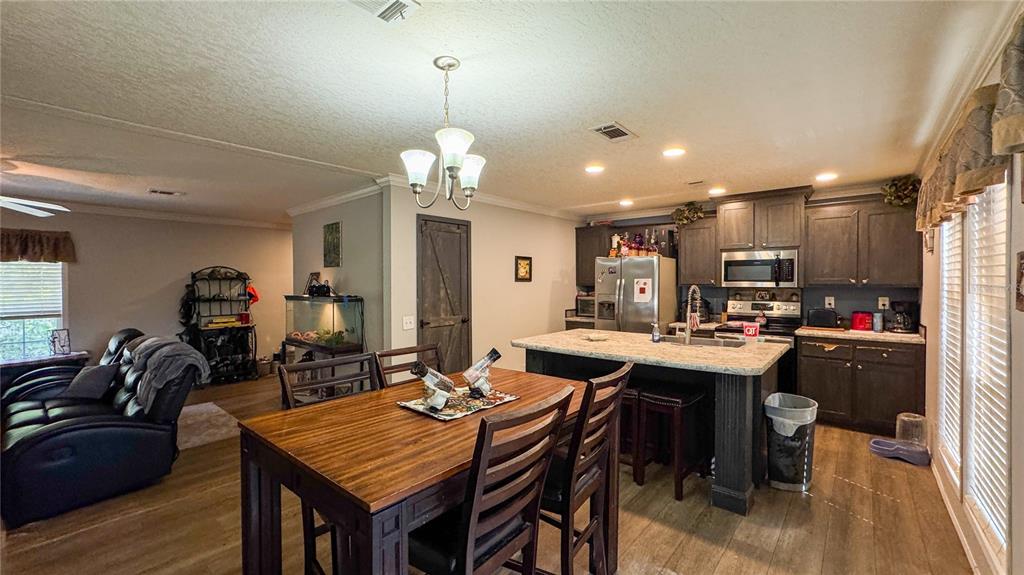 29040 Sentinel Street Nobleton, FL 34661 - Photo 5 of 21 a view of a dining room and livingroom