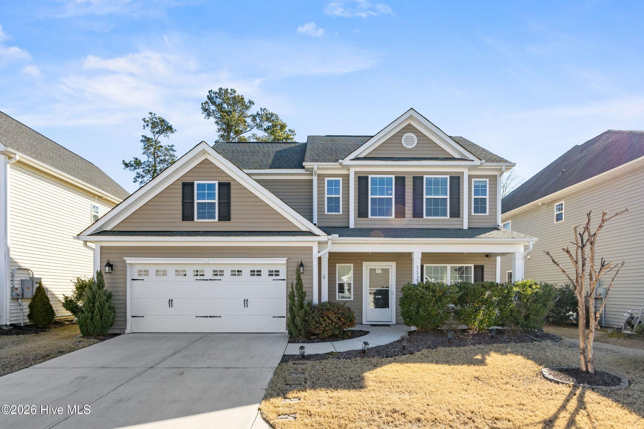 112 Collins Way Hampstead, NC 28443 - Photo 2 of 53 1_front exterior