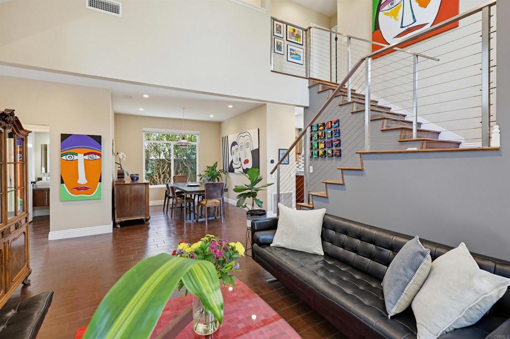 2756 Southampton Road Carlsbad, CA 92010 - Photo 5 of 40 a living room with furniture and a floor to ceiling window