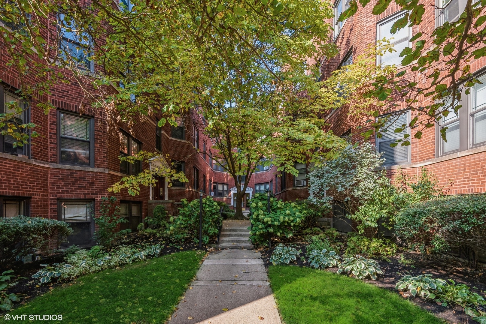 522 Sheridan Road, Unit 3A Evanston, IL 60202 - Photo 1 of 16 a view of a pathway both side of house