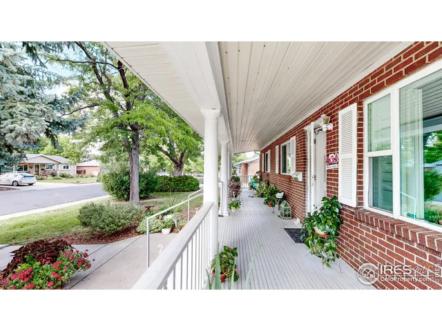 a picture of a table and chairs in patio of the house