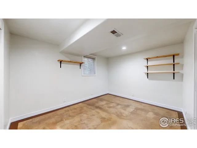 a living room with a rug