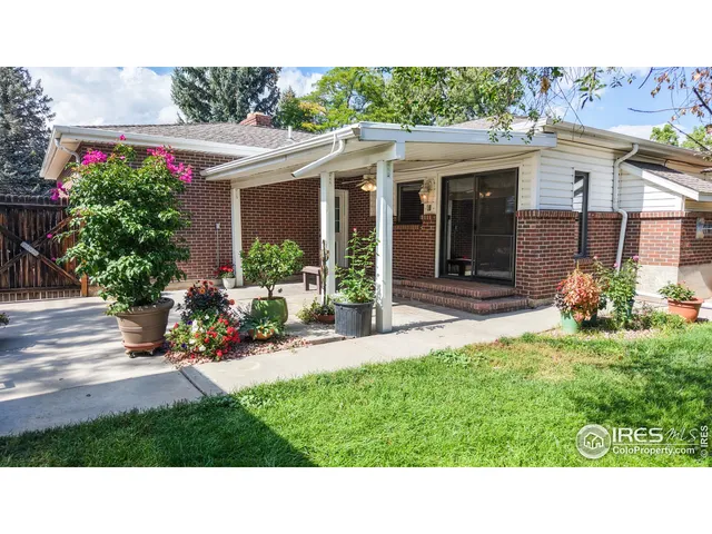 a black and white photo of a house