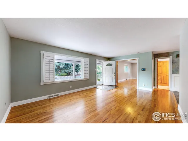 a bathroom with a sink and a large window