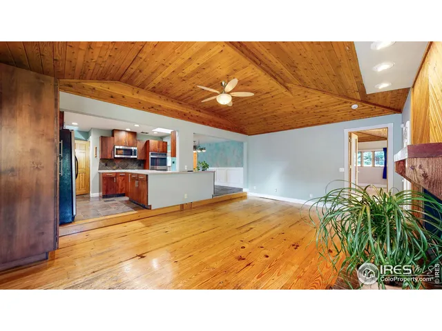 a view of a living room and bathroom